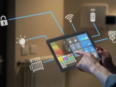 Insured and certified AFTECHS smart home installation technicians configuring a residential smart home automation system